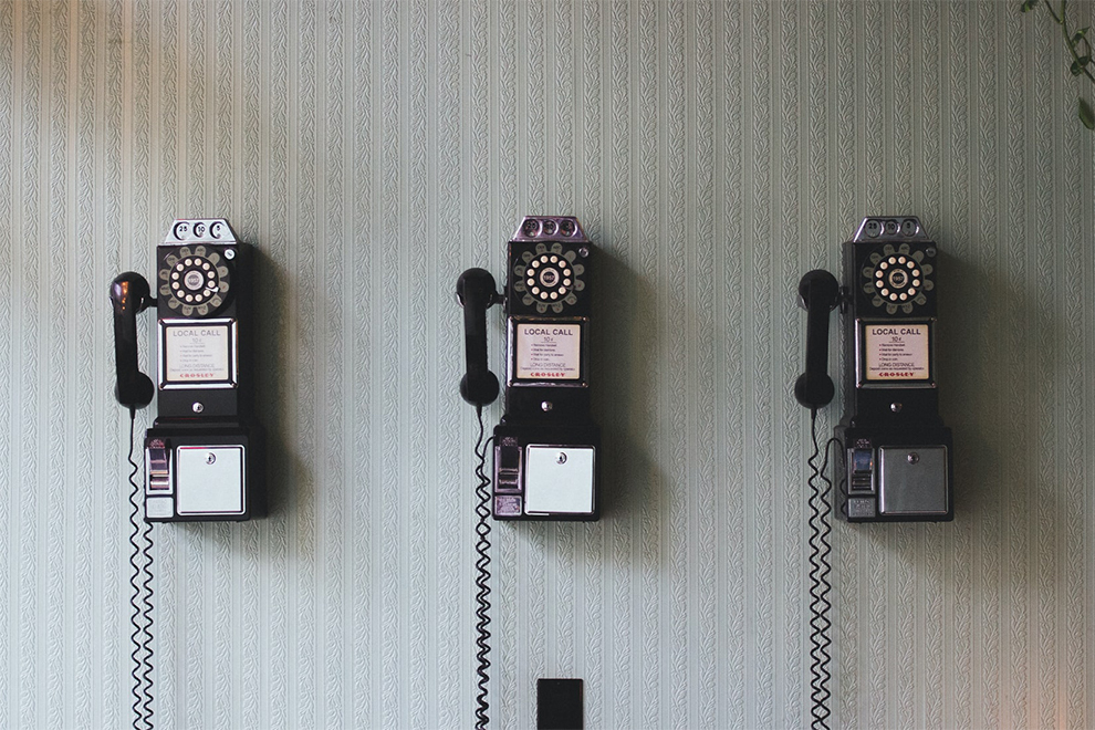 A picture of some vintage phones